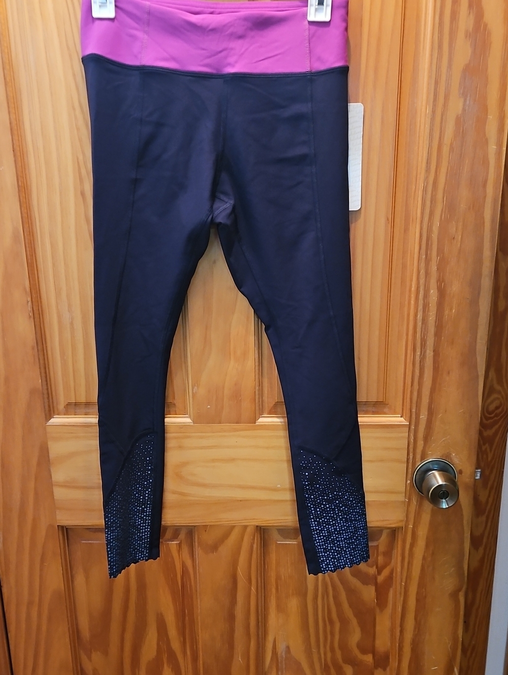 Lululemon Black Leggings with Pink Waistband and Accented Ankles
